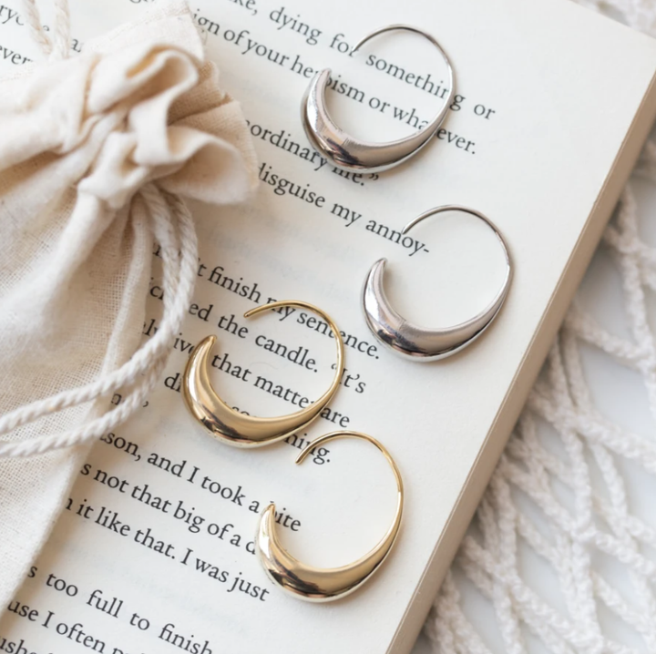 Luxuriöse Ohrringe aus Gold und Silber